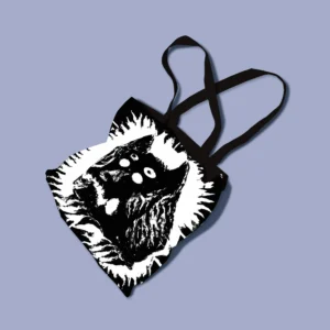 En totebag med motivet av en fyrögd varg